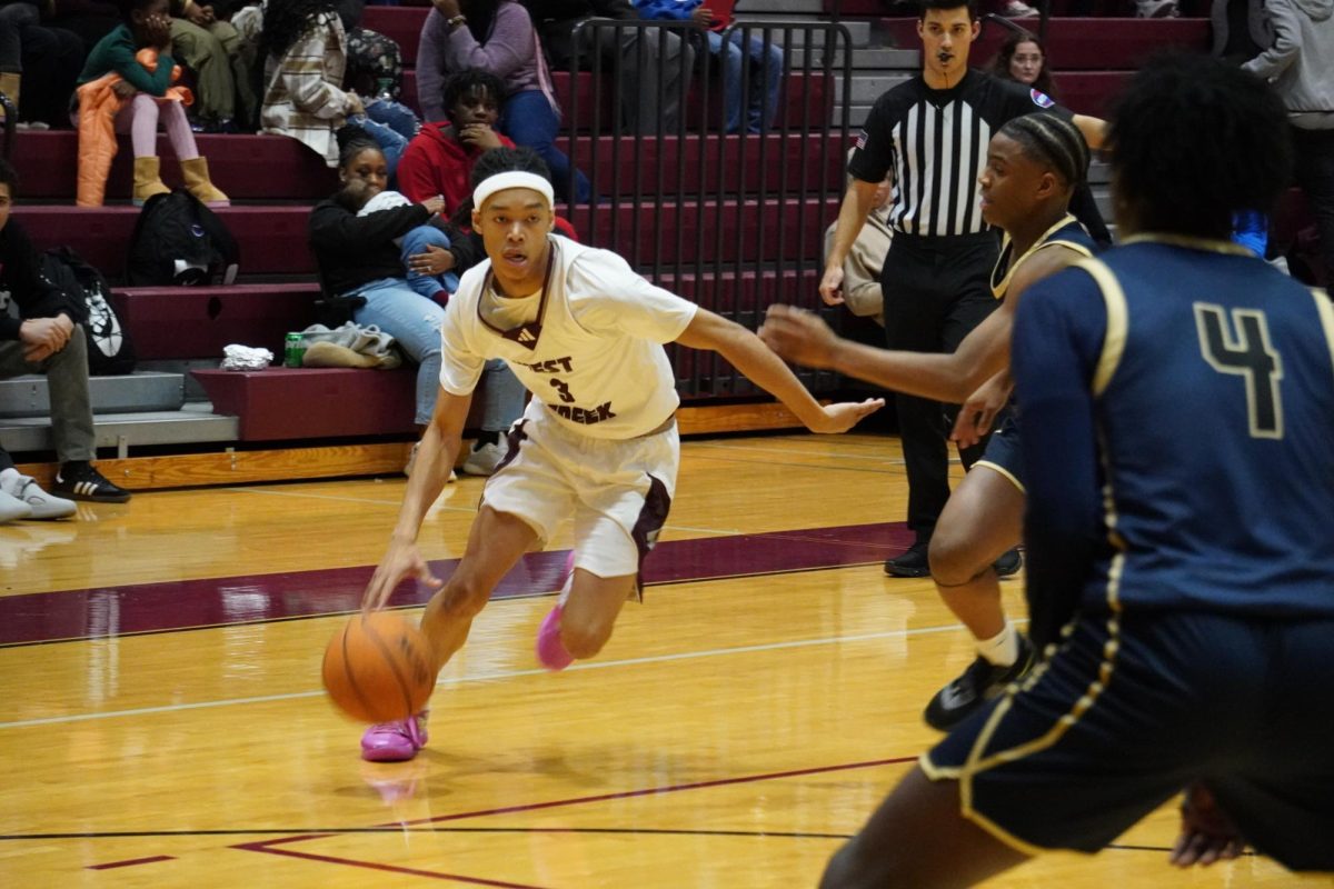 Junior point guard Kam Bowers drives to the basket against Chattanooga Prep on Dec. 13. The Coyote defeated the Sentinels 71-64.