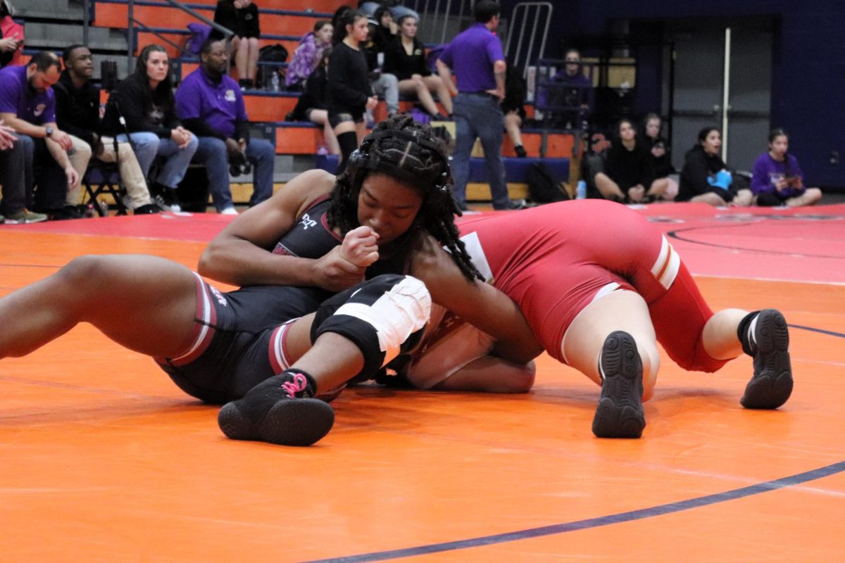 Senior Jes'Onia Barefield grapples with her opponent during the girls sectional match on Wednesday, Jan. 22, 2025. (File photo by Caitlyn Mercado)